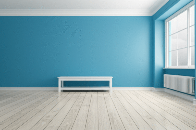 Cores Calmantes para o Bem-Estar Sala de estar com paredes pintadas em tons de azul claro e móveis brancos, criando um ambiente tranquilo e relaxante.